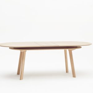 Table ovale extensible PARATI, Vue d’ensemble en version extensible avec rallonge mise en place. Made in France - Drugeot - L’Inatelier