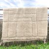 tapis-en-laine-blanc